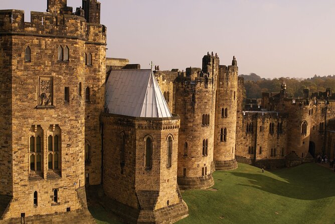 Edinburgh: Alnwick Castle & The Borders Hogwarts Filming Location - Bamburgh Castle and the North Sea shore