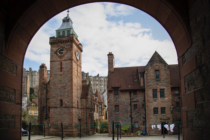 Edinburgh: Dean Village & New Town Walking Tour - George Street, statues, and grand commercial Edinburgh