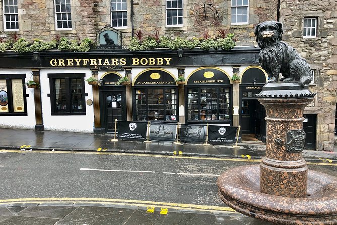 Essential Walking Tour of Edinburgh's Old Town - Walking downhill along the Royal Mile