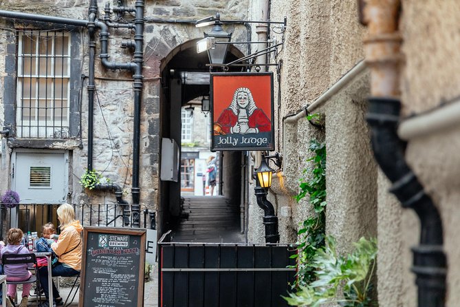 Highlights & Hidden Gems With Locals: Best of Edinburgh Private Tour - Quiet closes, cemeteries, and side streets