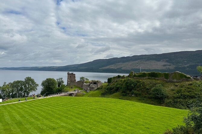 Loch Ness Tour: Day Trip to Loch Ness, Outlander Sites and More - Urquhart Castle and the broad Loch Ness view